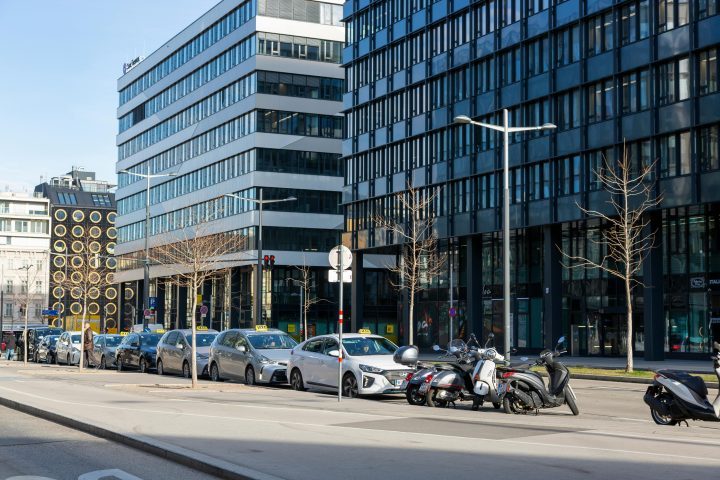 Modern urban street scene with parked vehicles