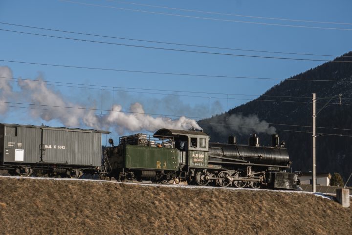 Historic steam train on mountain railway
